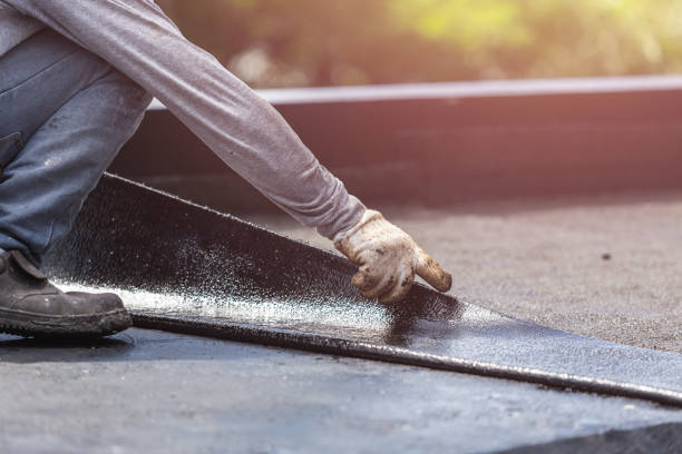 Professional Basement Waterproofing technician working in Fairhope, PA
